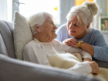 Elderly,Woman,With,Her,Caregiver,At,Nursing,Home